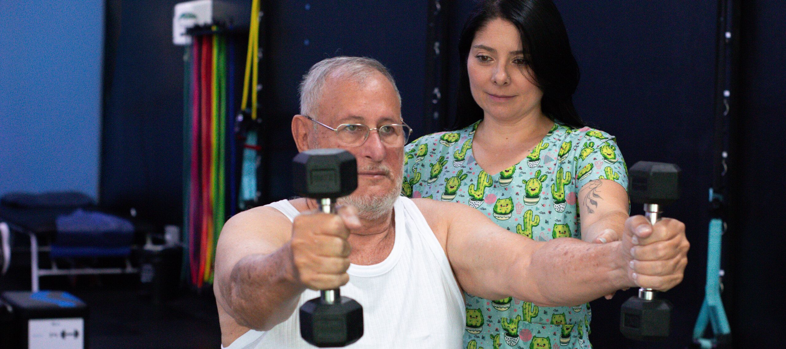Raquel providing physical therapy treatment